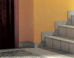 Если во всем доме вдоль стен уложены керамические плинтусы, логично оформить ими и ступени лестницы. Керамические плинтусы для лестницы из керамической плитки.